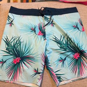 Billabong Men's Aqua Tropical Board Shorts with Pink Floral Accents